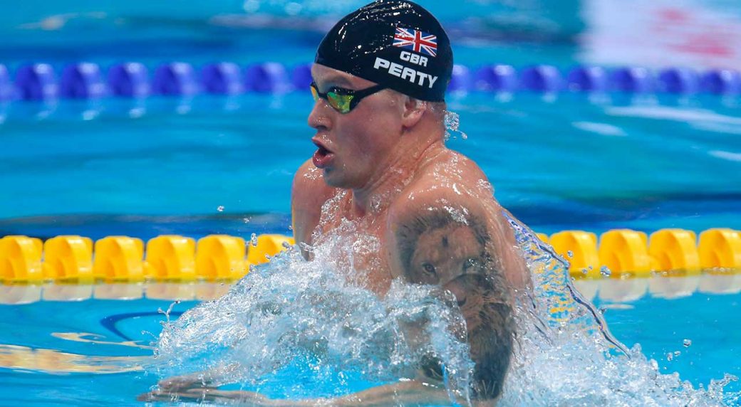 Adam Peaty breaks world record in men's 50m breaststroke at worlds