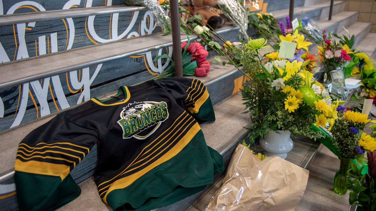 memorial at the stairs that lead to Elgar Petersen Arena is shown in Humboldt, Sask., on Saturday, April 7, 2018. RCMP say 14 people are dead and 14 people were injured Friday after a truck collided with a bus carrying a junior hockey team to a playoff game in northeastern Saskatchewan. Police say there were 28 people including the driver on board the Humboldt Broncos bus when the crash occurred at around 5 p.m. on Highway 35 north of Tisdale. THE CANADIAN PRESS/Liam Richards