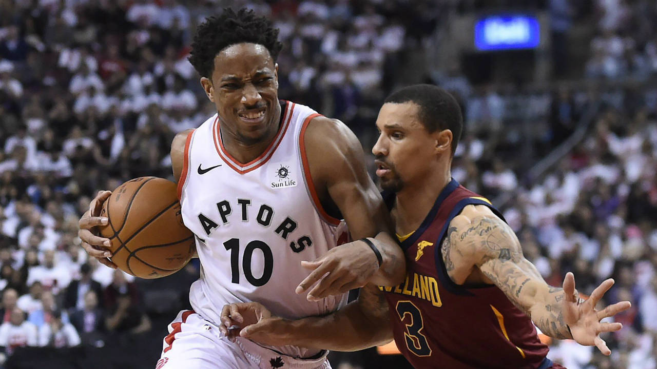 Toronto Raptors guard DeMar DeRozan (10) battles Cleveland Cavaliers guard George Hill (3) in Toronto on Tuesday, May 1, 2018. (Nathan Denette/CP)