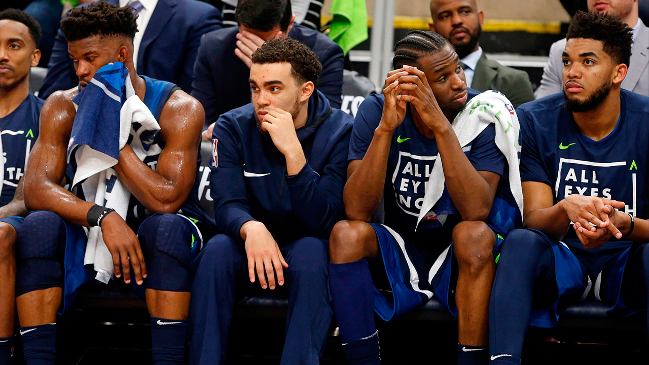 timberwolves-players-sit-on-the-bench