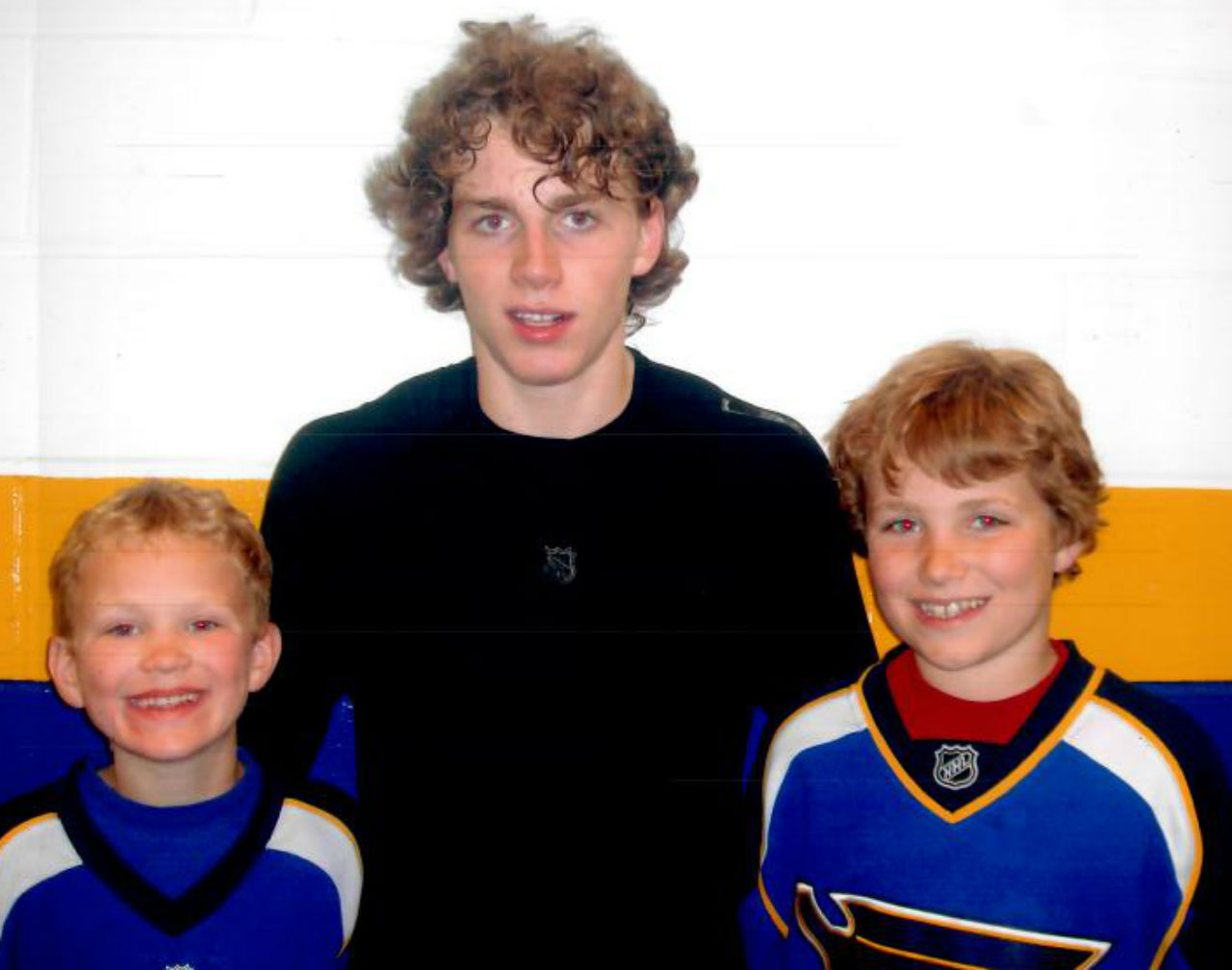 Patrick Kane poses with a young Brady (L) and Matthew Tkachuk.